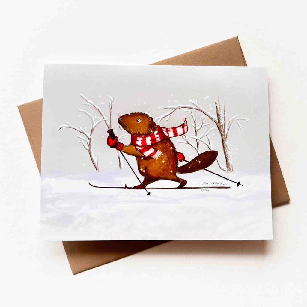A greeting card featuring a beaver cross country skiing (aka Nordic skiing) in the snow