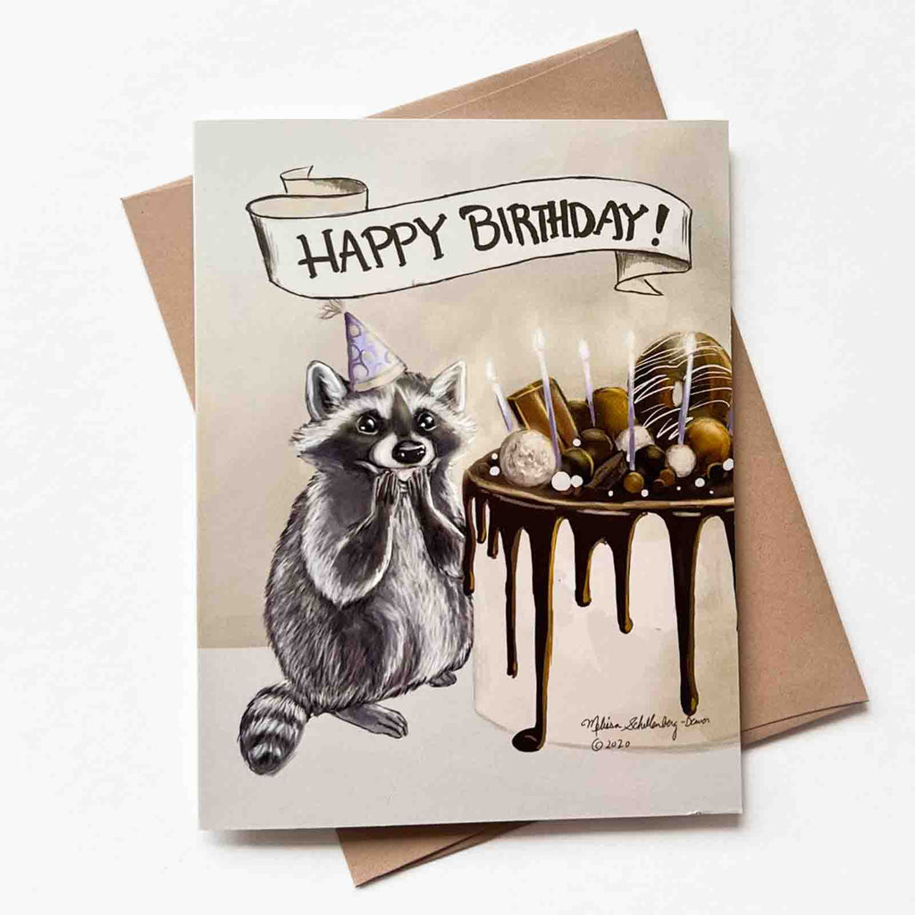 a raccoon looking surprised and grateful for a chocolate cake