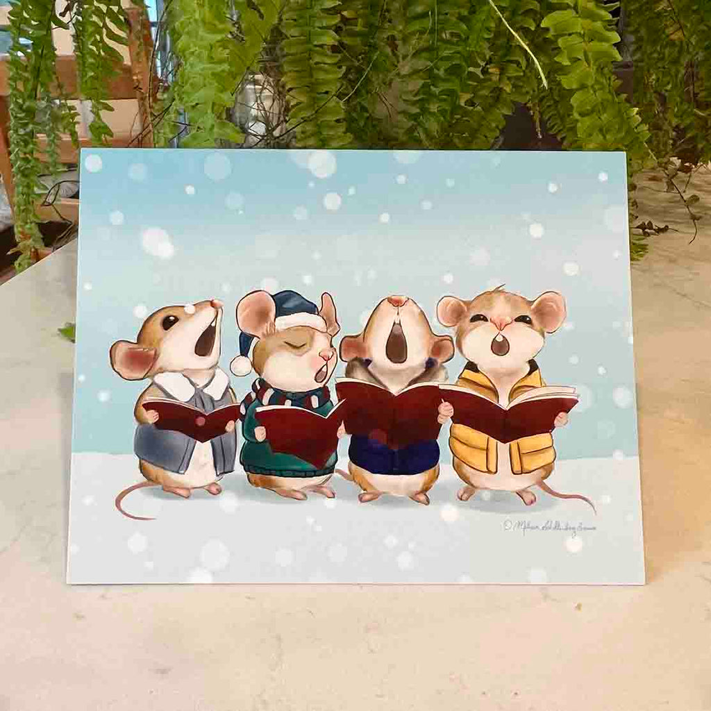 A holiday card featuring a group of 4 mice singing Christmas carols in the snow while wearing warm winter clothes.